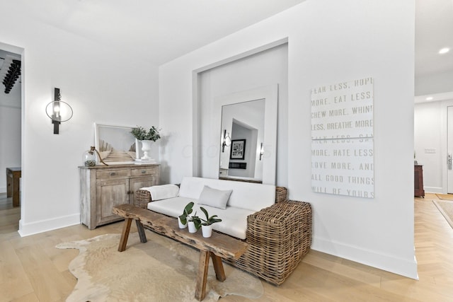 sitting room featuring light hardwood / wood-style floors