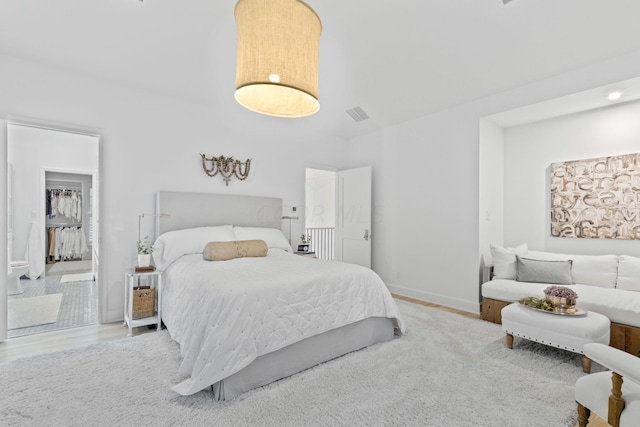 bedroom with light hardwood / wood-style flooring