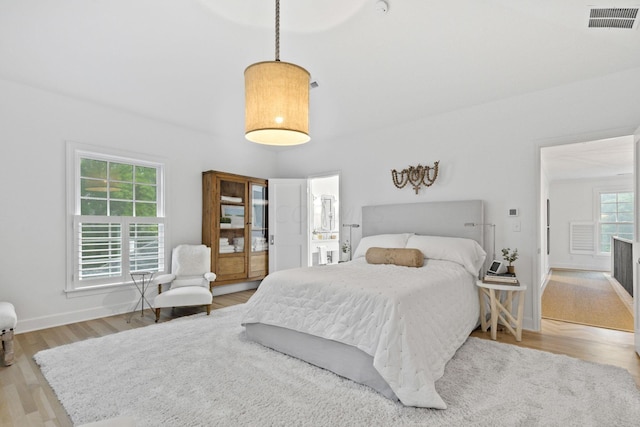 bedroom featuring light hardwood / wood-style flooring