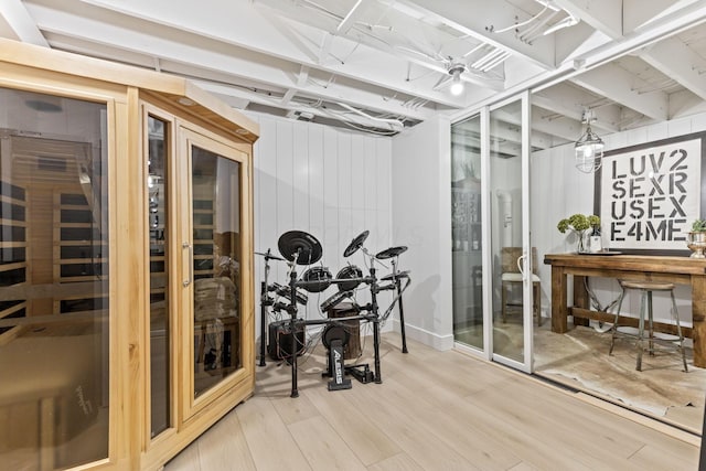 interior space featuring hardwood / wood-style floors and ceiling fan