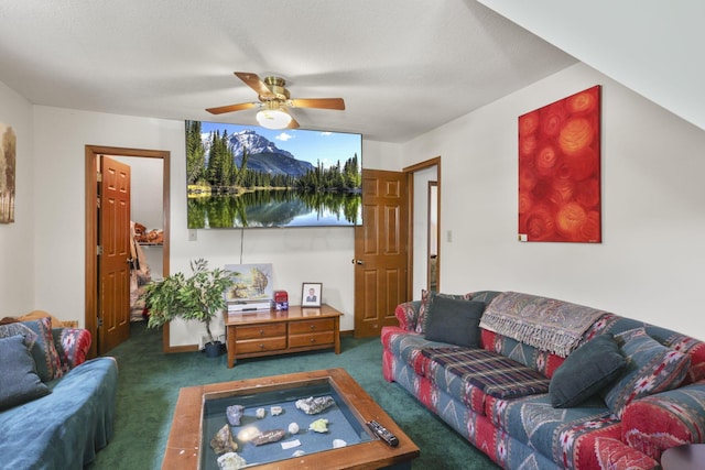 carpeted living room featuring a textured ceiling and ceiling fan