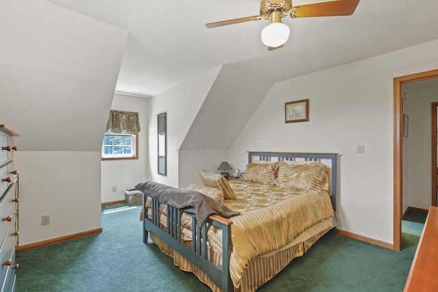 carpeted bedroom with ceiling fan and vaulted ceiling