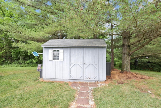 view of outdoor structure with a yard