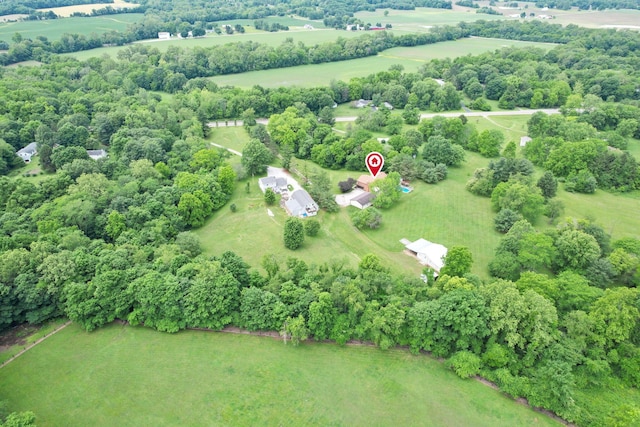 birds eye view of property with a rural view