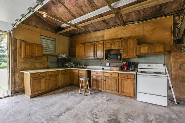 kitchen featuring sink, plenty of natural light, vaulted ceiling, and white electric stove