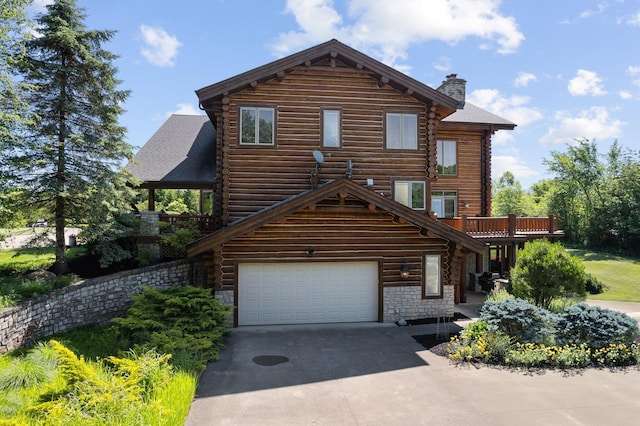 log home with a garage