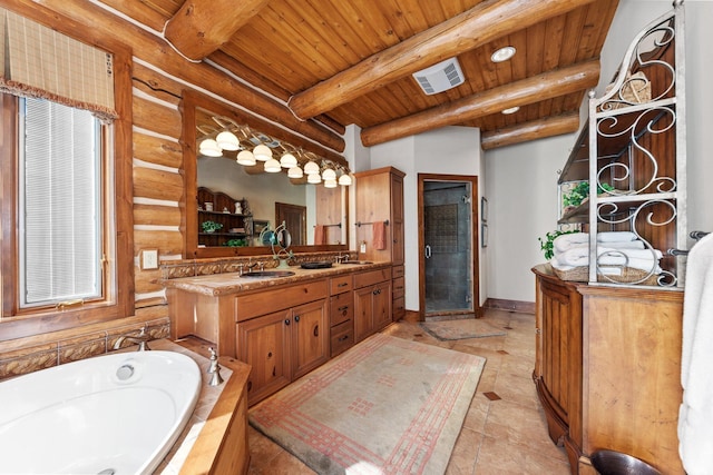 bathroom featuring tile patterned floors, vanity, plus walk in shower, wooden ceiling, and beamed ceiling