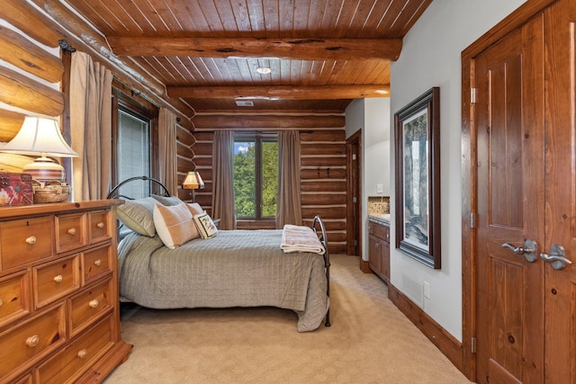 bedroom featuring beam ceiling, light colored carpet, and wooden ceiling