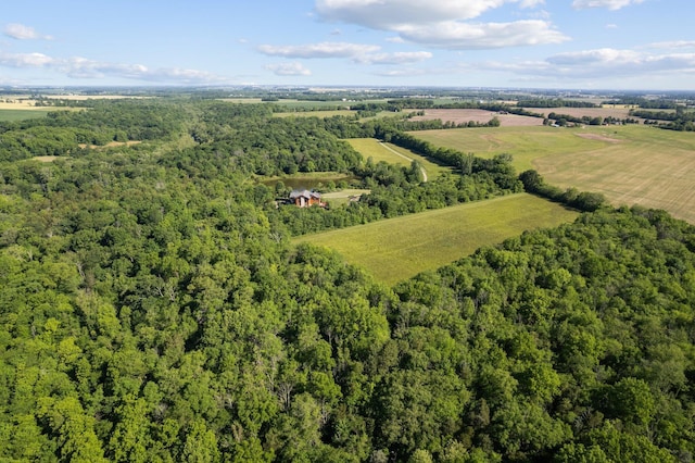 birds eye view of property with a rural view