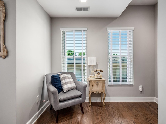 sitting room with hardwood / wood-style floors