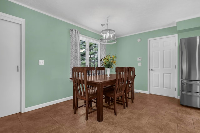 dining space featuring a chandelier