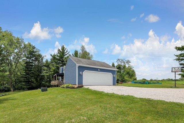 exterior space with a lawn and a garage