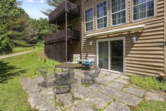 view of patio / terrace with a balcony