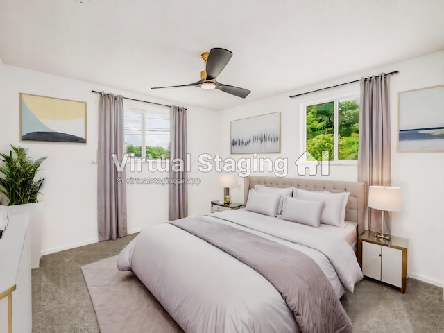 bedroom with ceiling fan and carpet floors