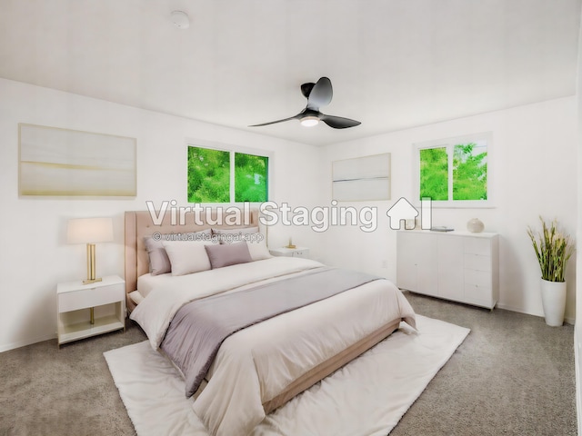 bedroom featuring carpet and ceiling fan