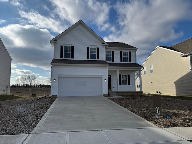 view of front facade featuring covered porch and a garage