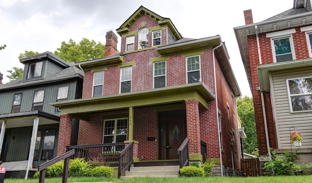 view of front of property featuring covered porch