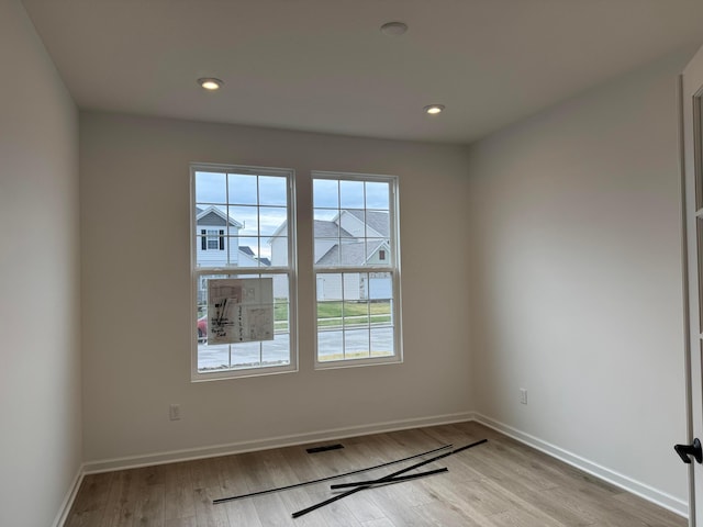 empty room featuring light hardwood / wood-style floors