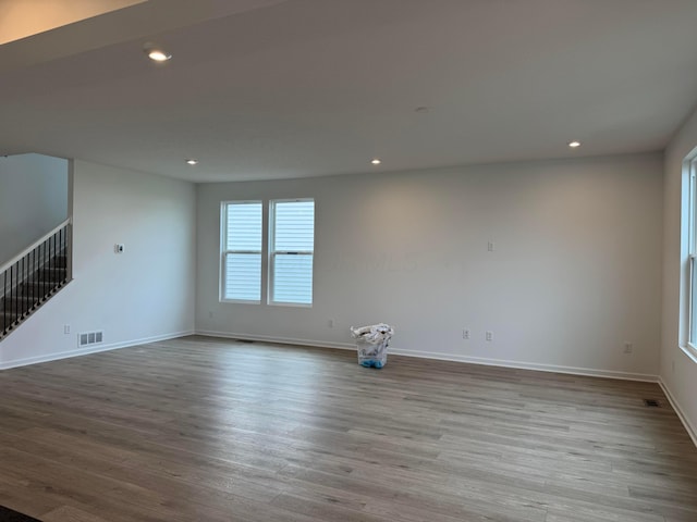 unfurnished living room featuring light wood-type flooring