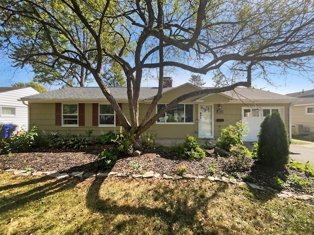 ranch-style home with a front yard