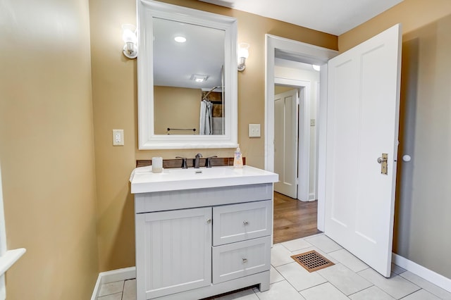 bathroom featuring vanity and tile patterned floors