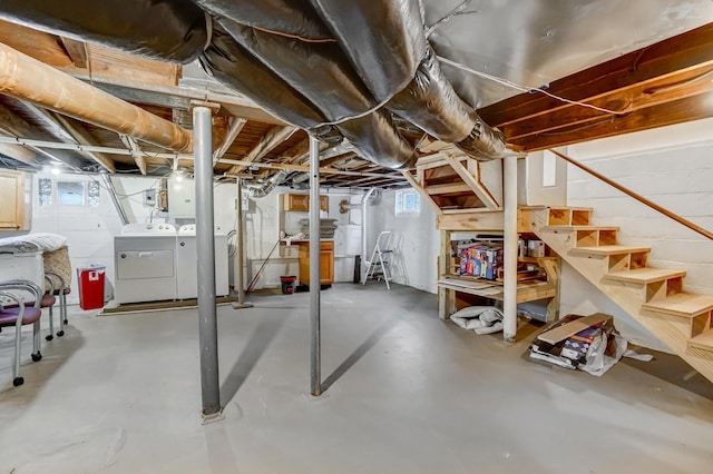 basement featuring washer and dryer and a healthy amount of sunlight