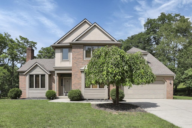 view of front of home featuring a garage and a front lawn