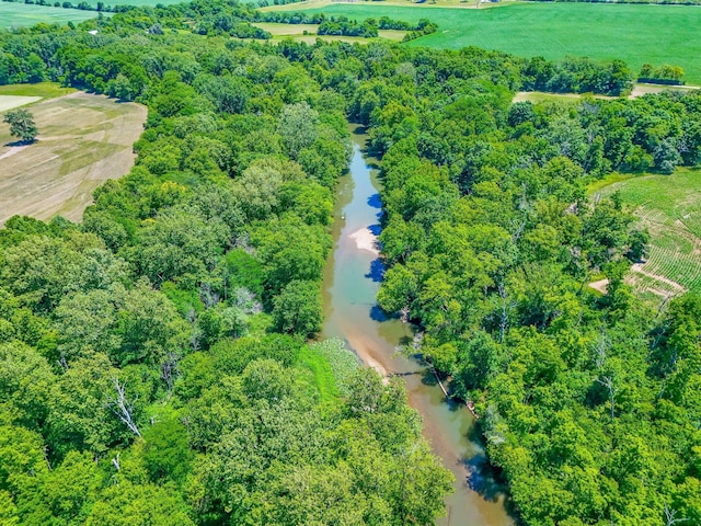 aerial view with a rural view and a water view