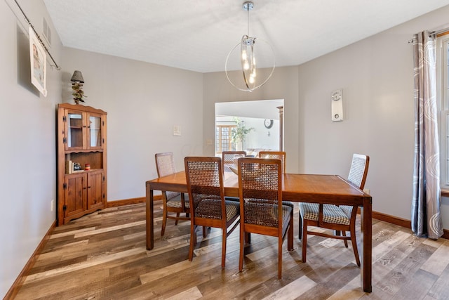 dining area featuring hardwood / wood-style flooring