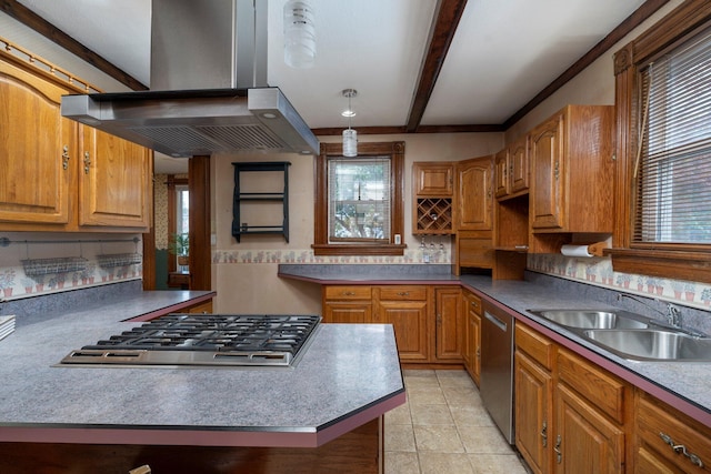 kitchen with island exhaust hood, appliances with stainless steel finishes, tasteful backsplash, and sink