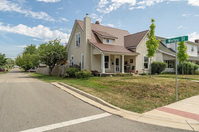 view of front facade featuring a porch and a front yard