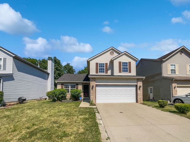 view of front property with a garage and a front lawn