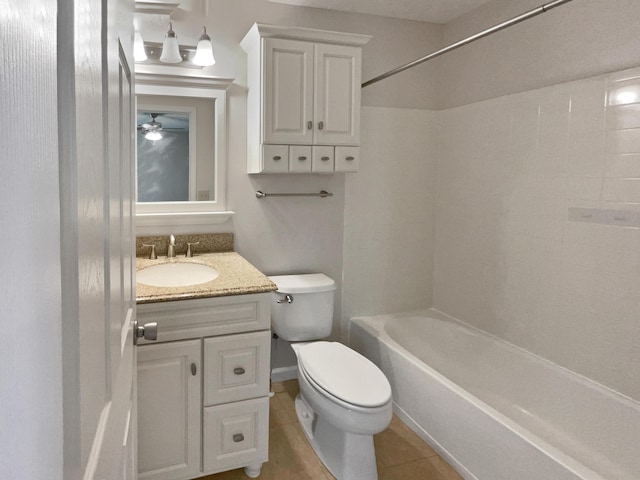 full bathroom with tile patterned flooring, vanity, toilet, and washtub / shower combination