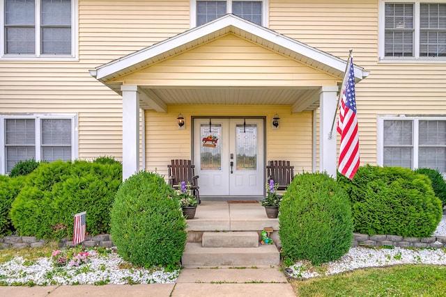 property entrance with covered porch