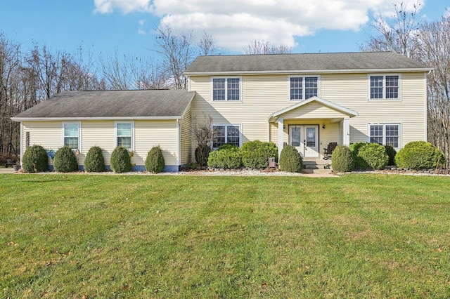 view of front facade featuring french doors and a front lawn