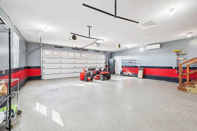 garage with a wall mounted air conditioner