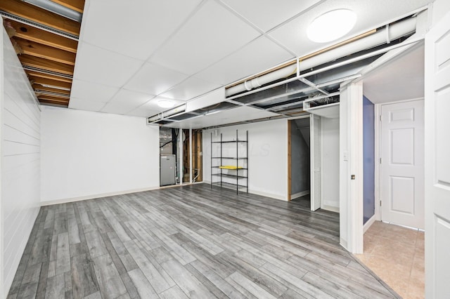 basement featuring hardwood / wood-style flooring