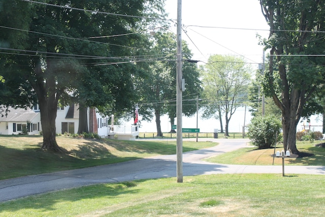 view of home's community featuring a yard