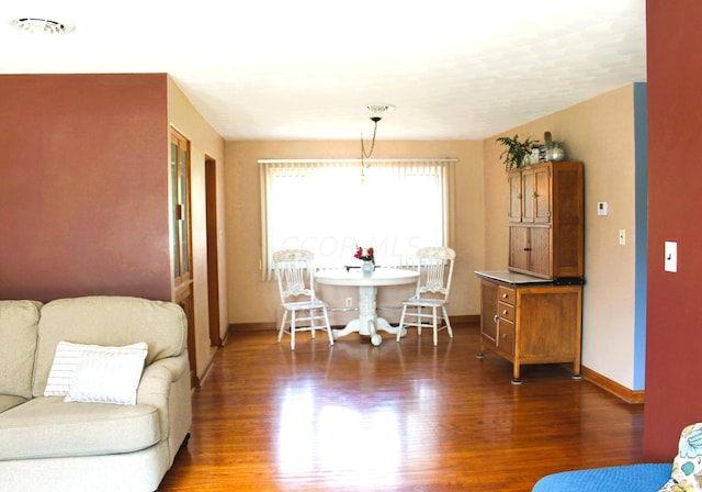 dining room featuring dark hardwood / wood-style flooring