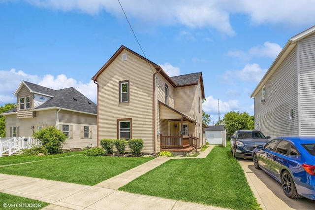 view of front of home featuring covered porch and a front yard