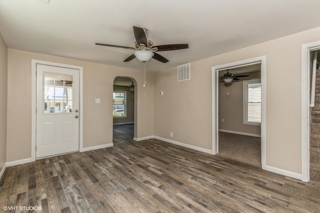 entrance foyer with ceiling fan and dark hardwood / wood-style floors