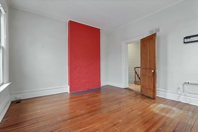 unfurnished room featuring wood-type flooring