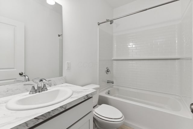 full bathroom featuring vanity, shower / bathtub combination, and toilet