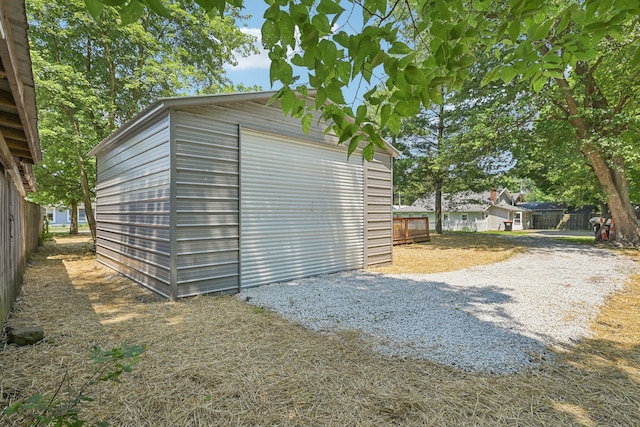 view of outbuilding featuring a garage