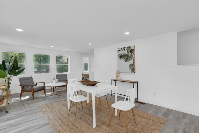 dining area with light hardwood / wood-style flooring