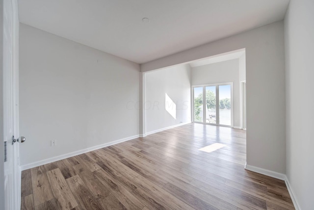 empty room featuring light hardwood / wood-style floors