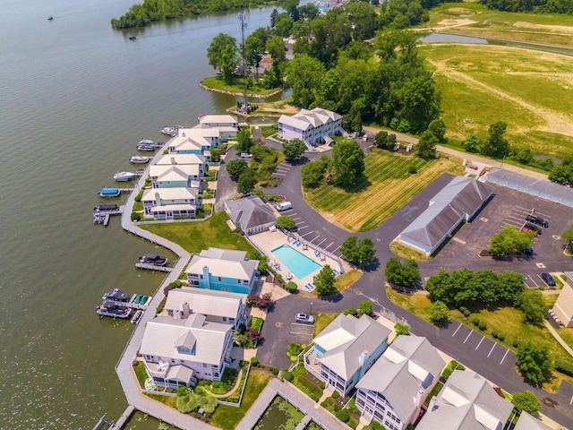 birds eye view of property featuring a water view