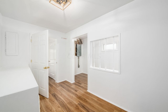 hallway with light wood-type flooring