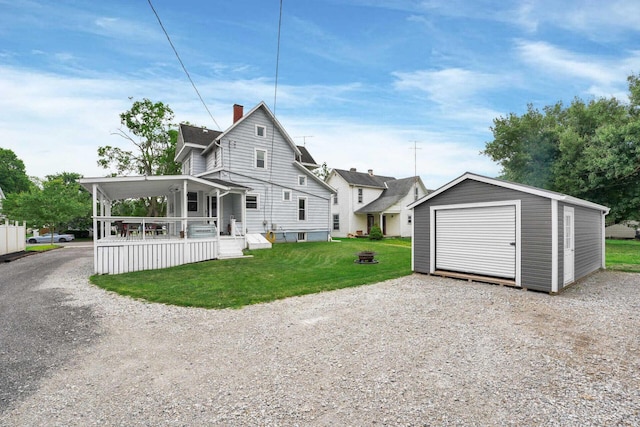 exterior space with a front yard, a porch, and a storage unit