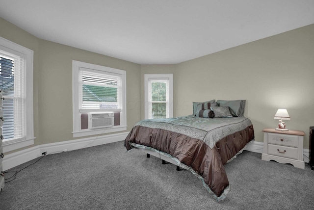 bedroom with carpet flooring and cooling unit